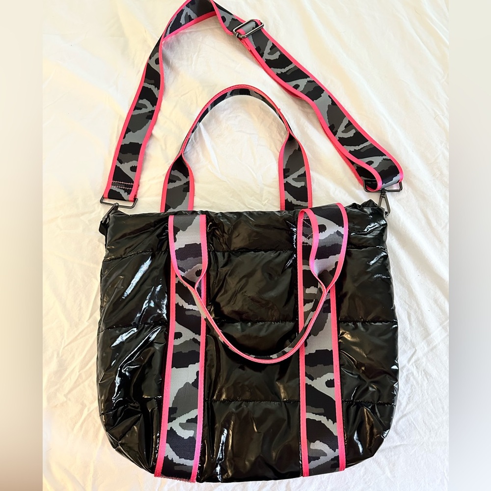 black adjustable crossbody or shoulder bag